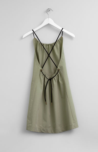 backless dress shopee Allegra, fitted halter-neck backless dress with an exaggerated curly hem, Shop #ROTOUCHExJEANTIRTAMARTA collection now available on Shopee, Tokopedia, and Whatsapp